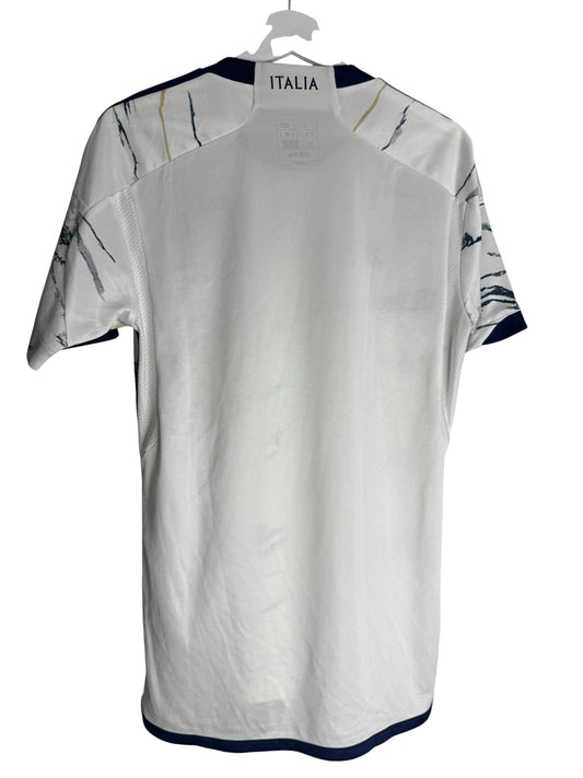 Dos du maillot de football officiel Levestiairedupeuple Italie blanc avec motif marbré et détails bleu marine