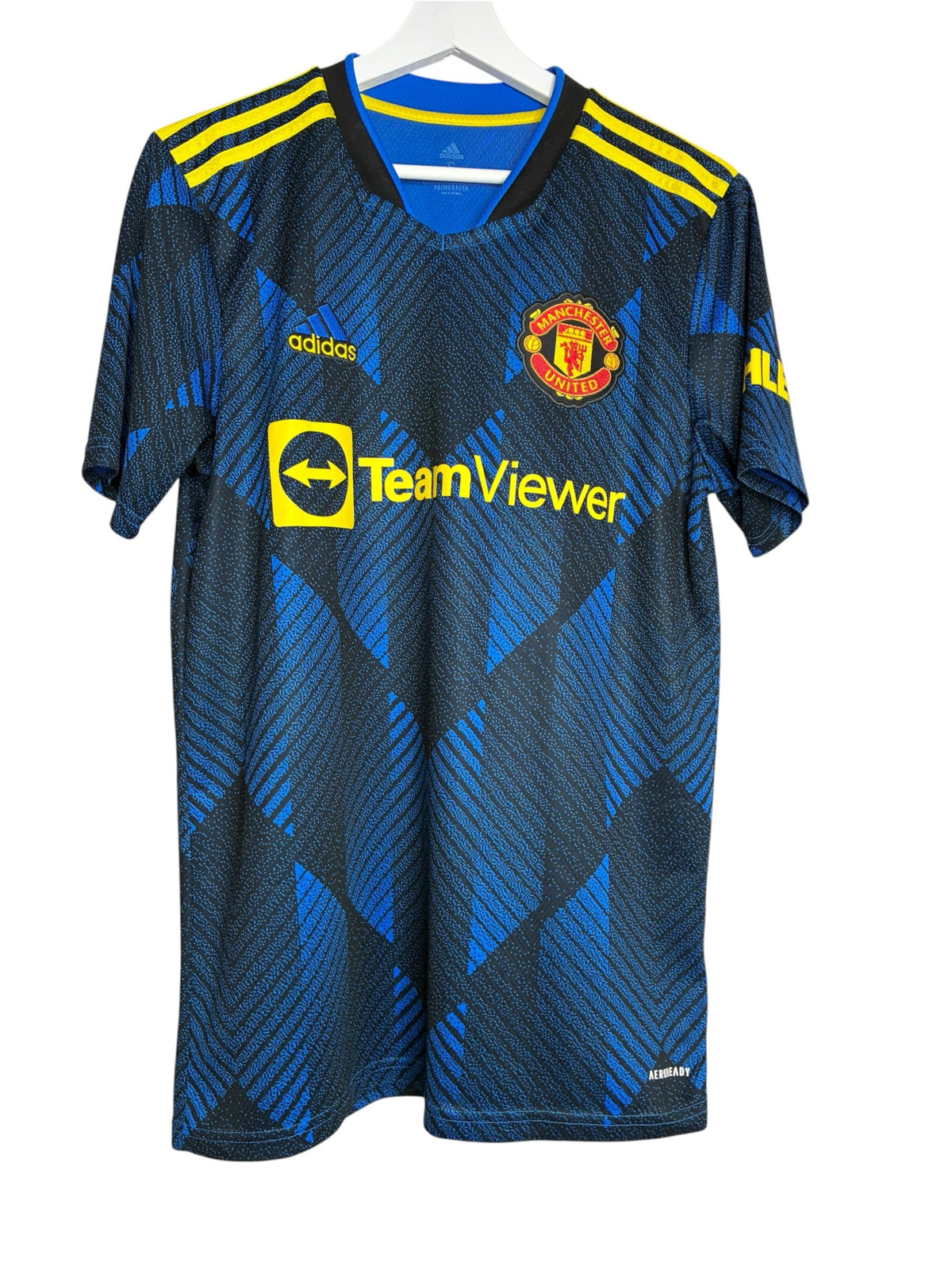 Maillot de football Levestiairedupeuple Manchester United bleu et noir avec détails jaunes et technologie AEROREADY