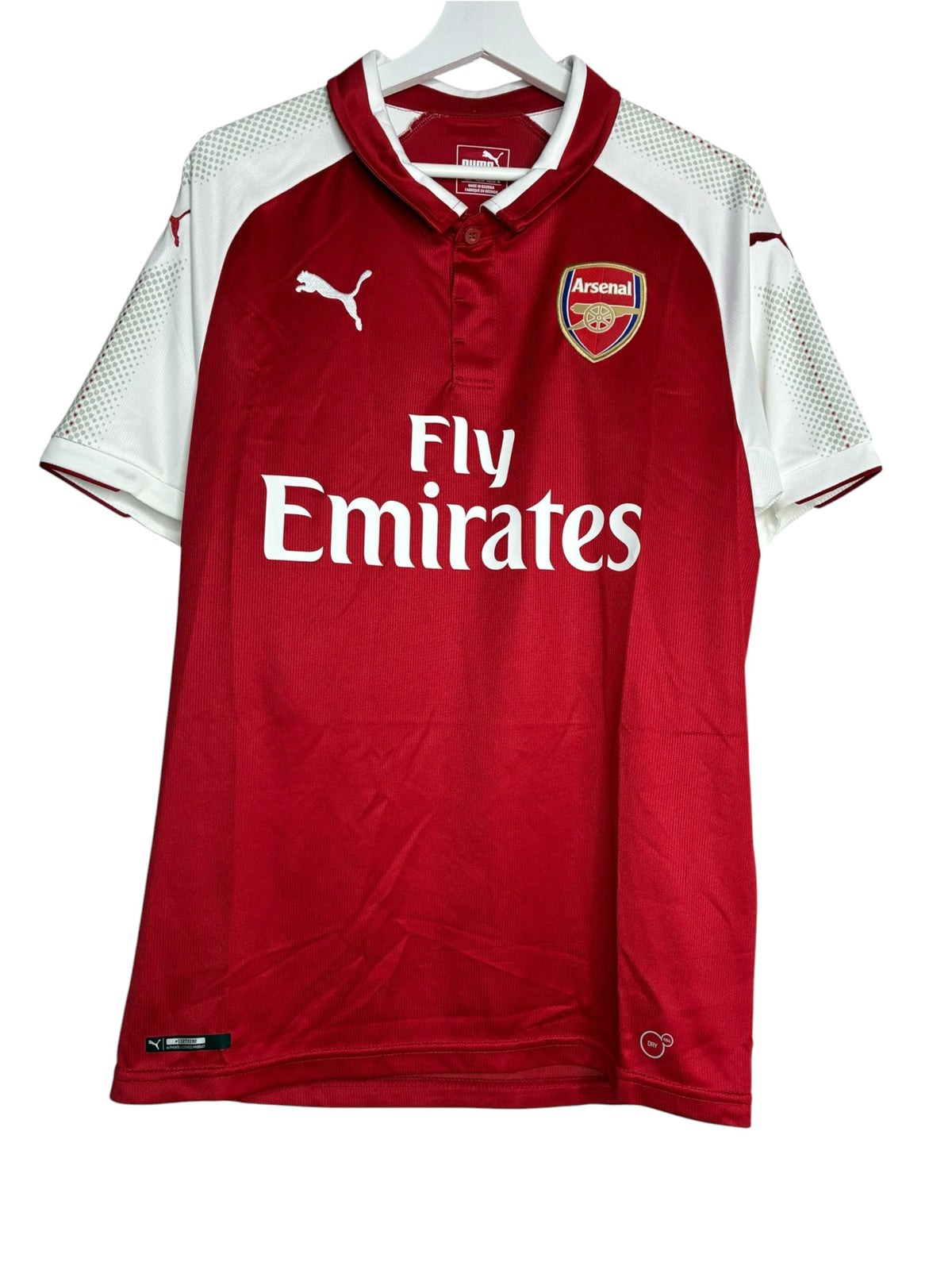 Maillot domicile officiel Arsenal Puma rouge et blanc avec col boutonné, blason du club et logo Fly Emirates