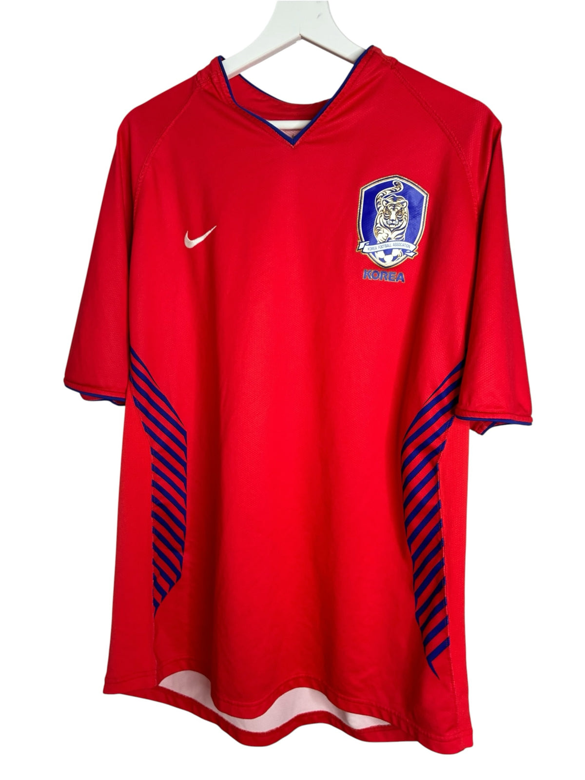Maillot de football rouge Nike Levestiairedupeuple de l'équipe nationale de Corée du Sud avec détails bleus