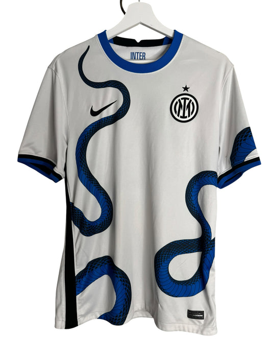 Maillot extérieur Nike Inter Milan blanc avec motif serpent bleu, logo du club et swoosh, par Levestiairedupeuple