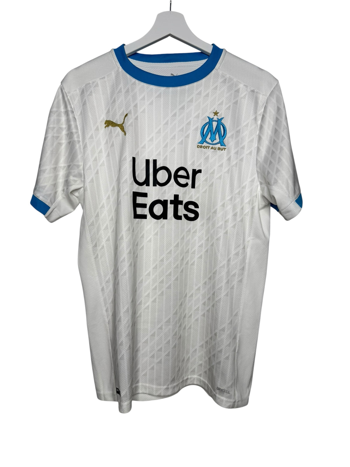 Maillot domicile officiel Puma de l'Olympique de Marseille blanc avec détails bleus et logos dorés Levestiairedupeuple
