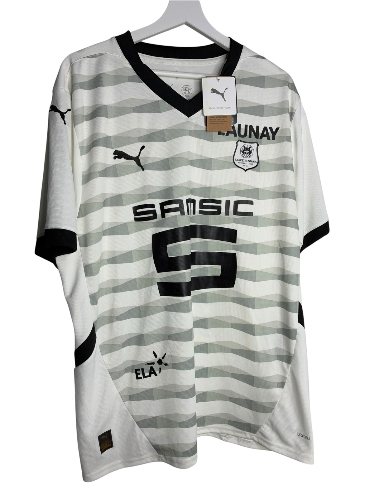 Maillot de football officiel Puma Stade Rennais blanc et gris avec motifs géométriques et détails noirs Levestiairedupeuple