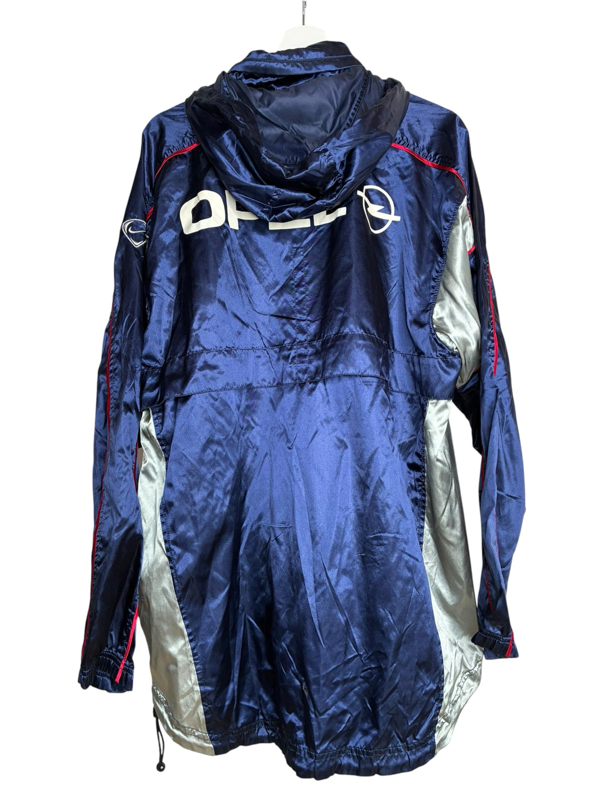 Veste coupe-vent vintage Levestiairedupeuple bleu marine et argent avec logo Opel au dos, style football années 90